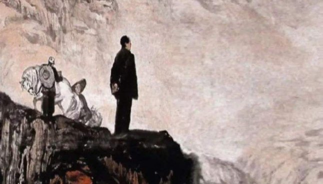 “不到长城非好汉，屈指行程二万”是什么意思？