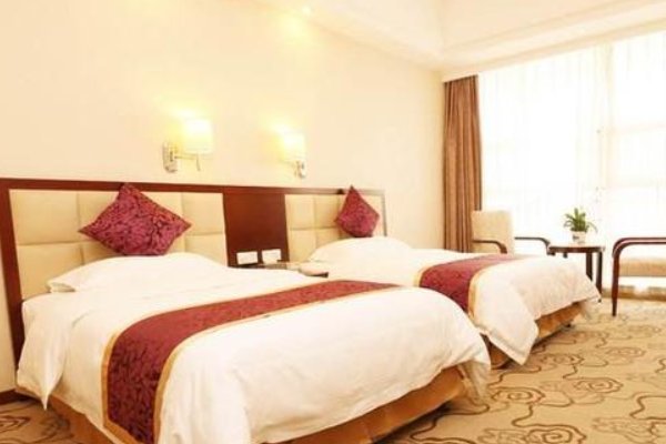 酒店的标准单人房和标准双人房有什么不同？分别有几张床？