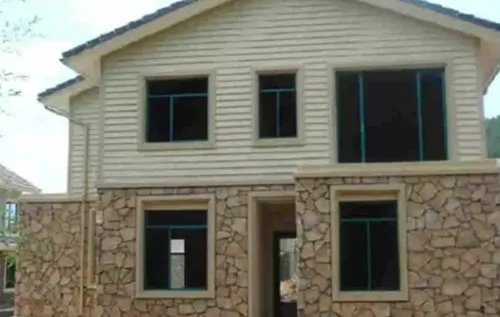 农村别墅外墙装修效果图 外墙用真石漆还是瓷砖